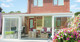 Gardendreams | Tuinkamer met schuifpui en polycarbonaat dakbedekking | 600 x 300 cm